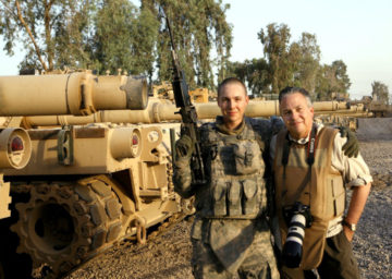 David Woo with his son in Iraq